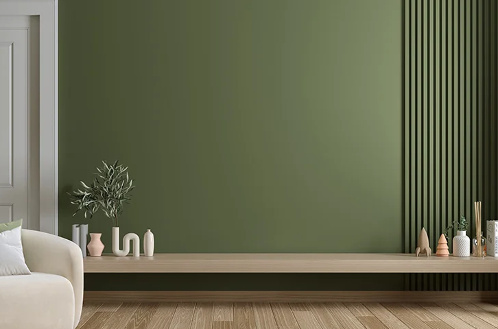 Olive green painted living room wall